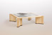 Table basse &agrave; pi&egrave;tement &laquo;&nbsp;cylindromate&nbsp;&raquo; en sycomore ond&eacute; et acajou. 